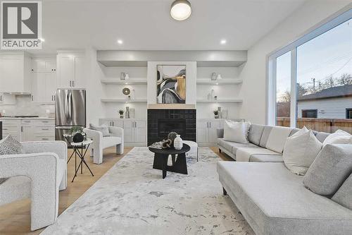4615 82 Street Nw, Calgary, AB - Indoor Photo Showing Living Room With Fireplace