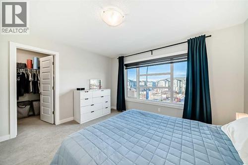 115 Wolf Hollow Park Se, Calgary, AB - Indoor Photo Showing Bedroom