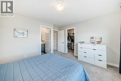 115 Wolf Hollow Park Se, Calgary, AB - Indoor Photo Showing Bedroom