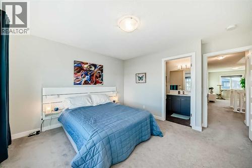 115 Wolf Hollow Park Se, Calgary, AB - Indoor Photo Showing Bedroom