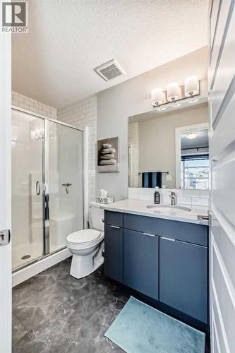 115 Wolf Hollow Park Se, Calgary, AB - Indoor Photo Showing Bathroom