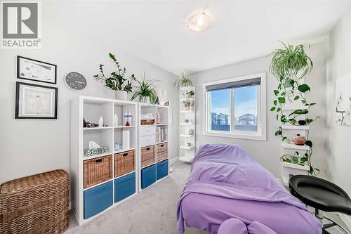 115 Wolf Hollow Park Se, Calgary, AB - Indoor Photo Showing Bedroom