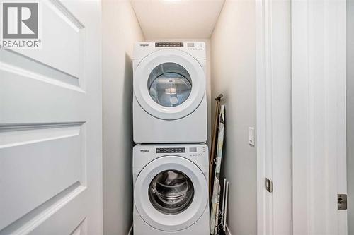 115 Wolf Hollow Park Se, Calgary, AB - Indoor Photo Showing Laundry Room