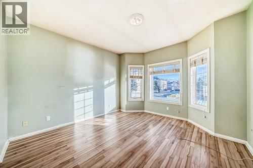 Primary bedroom - 205, 7 Lineham Avenue, Okotoks, AB - Indoor Photo Showing Other Room