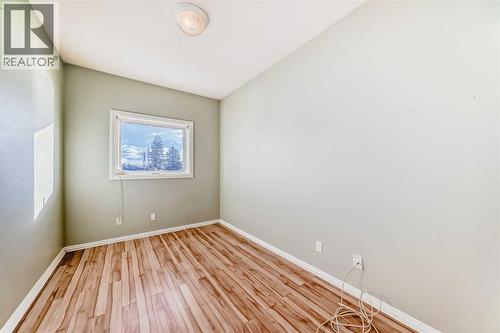 2nd bedroom - 205, 7 Lineham Avenue, Okotoks, AB - Indoor Photo Showing Other Room