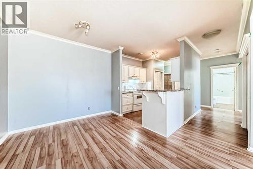 205, 7 Lineham Avenue, Okotoks, AB - Indoor Photo Showing Kitchen