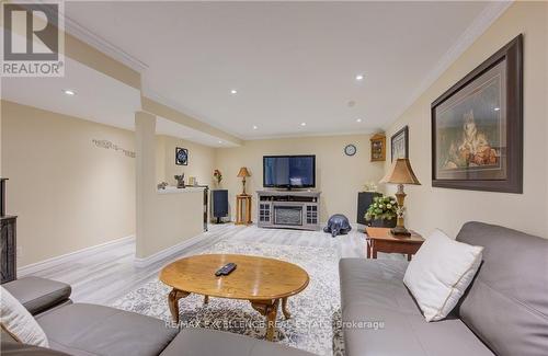 131 Gracefield Crescent, Kitchener, ON - Indoor Photo Showing Living Room With Fireplace