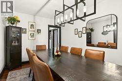 used as formal dining room also great as Main Floor Bedroom - 