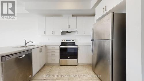 779 Heathrow Path, Oshawa, ON - Indoor Photo Showing Kitchen With Stainless Steel Kitchen With Double Sink