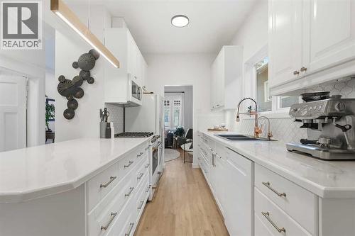 Kitchen - 712 5 Street Nw, Calgary, AB - Indoor Photo Showing Kitchen With Double Sink With Upgraded Kitchen