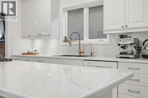 Kitchen Island - 712 5 Street Nw, Calgary, AB - Indoor Photo Showing Kitchen With Upgraded Kitchen