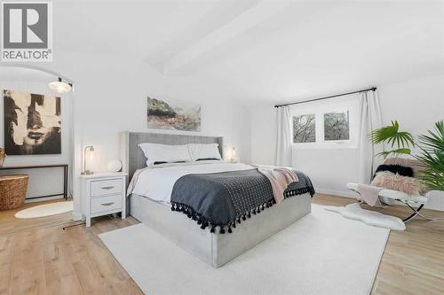 Primary Bedroom - 712 5 Street Nw, Calgary, AB - Indoor Photo Showing Bedroom