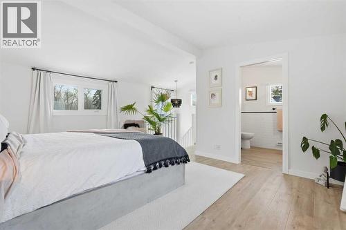 Primary Bedroom - 712 5 Street Nw, Calgary, AB - Indoor Photo Showing Bedroom