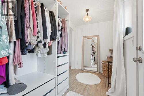 Primary Walk In Closet - 712 5 Street Nw, Calgary, AB - Indoor With Storage