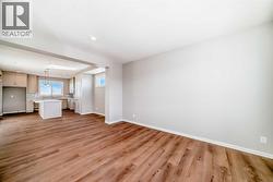 Living Room view to Dining Area & Kitchen - 