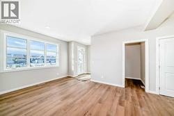 Living Room view to Front Entry & Pocket Office - 