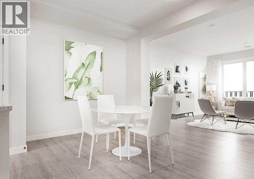 PLEASE NOTE: Photos are of a Showhome of the same model – fit & finish may differ. Interior selections & floorplans shown in photos - 162 Lanark Gate Se, Airdrie, AB - Indoor Photo Showing Dining Room