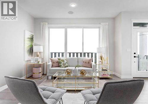 PLEASE NOTE: Photos are of a Showhome of the same model – fit & finish may differ. Interior selections & floorplans shown in photos - 162 Lanark Gate Se, Airdrie, AB - Indoor Photo Showing Living Room