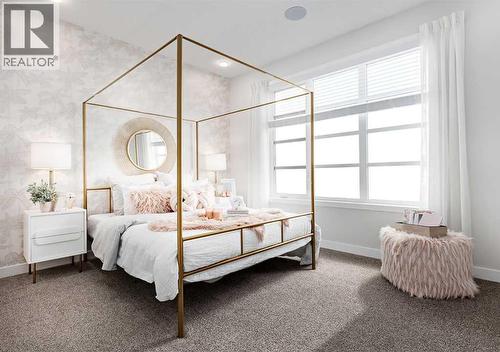 PLEASE NOTE: Photos are of a Showhome of the same model – fit & finish may differ. Interior selections & floorplans shown in photos - 162 Lanark Gate Se, Airdrie, AB - Indoor Photo Showing Bedroom