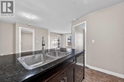 207, 355 Taralake Way Ne, Calgary, AB - Indoor Photo Showing Kitchen With Double Sink