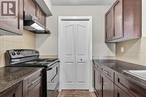 207, 355 Taralake Way Ne, Calgary, AB - Indoor Photo Showing Kitchen
