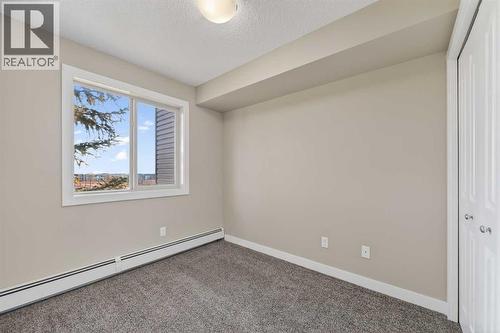 207, 355 Taralake Way Ne, Calgary, AB - Indoor Photo Showing Other Room