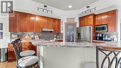 189 Rockyspring Terrace Nw, Calgary, AB - Indoor Photo Showing Kitchen With Stainless Steel Kitchen With Upgraded Kitchen