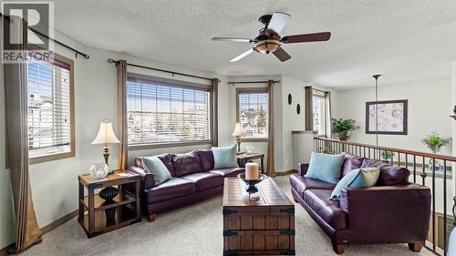 189 Rockyspring Terrace Nw, Calgary, AB - Indoor Photo Showing Living Room