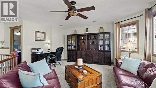 189 Rockyspring Terrace Nw, Calgary, AB - Indoor Photo Showing Living Room