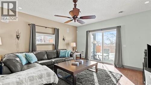 189 Rockyspring Terrace Nw, Calgary, AB - Indoor Photo Showing Living Room