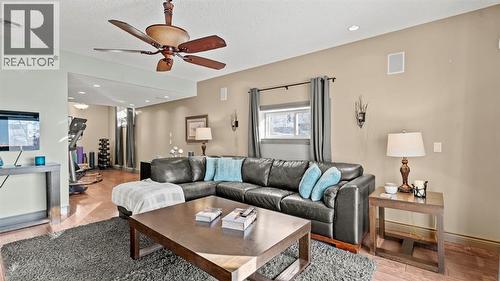 189 Rockyspring Terrace Nw, Calgary, AB - Indoor Photo Showing Living Room