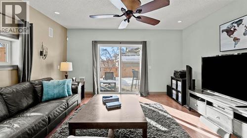189 Rockyspring Terrace Nw, Calgary, AB - Indoor Photo Showing Living Room