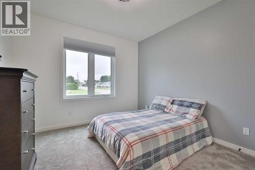 246 4A Street, Stirling, AB - Indoor Photo Showing Bedroom