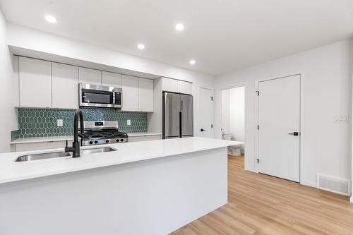 11939  101 Street, Edmonton, AB - Indoor Photo Showing Kitchen With Double Sink With Upgraded Kitchen