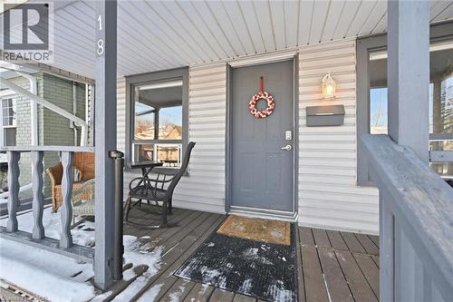 View of exterior entry with a porch - 18 Fraser Avenue, Hamilton, ON - Outdoor With Deck Patio Veranda With Exterior