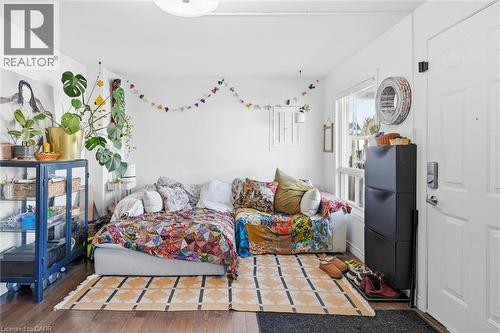 Living area with wood finished floors - 18 Fraser Avenue, Hamilton, ON - Indoor