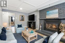 Virtually staged lower level family room - 