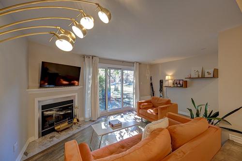 Salon - A-179 Av. De Navarre, Saint-Lambert, QC - Indoor Photo Showing Living Room With Fireplace