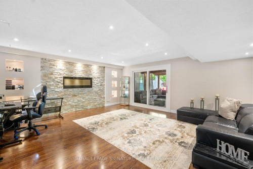 704 Robert Ferrie Drive, Kitchener, ON - Indoor Photo Showing Living Room With Fireplace