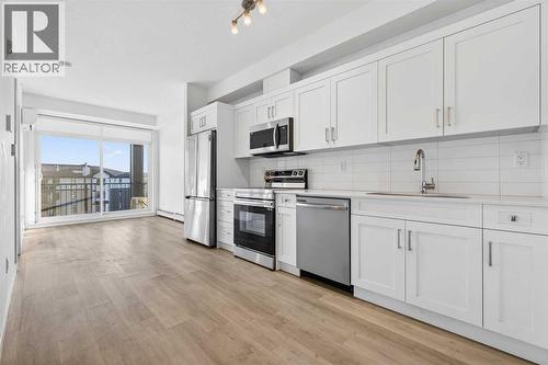 411, 40 Sage Hill Walk Nw, Calgary, AB - Indoor Photo Showing Kitchen