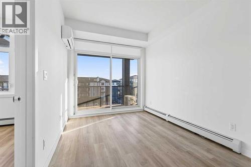 411, 40 Sage Hill Walk Nw, Calgary, AB - Indoor Photo Showing Other Room