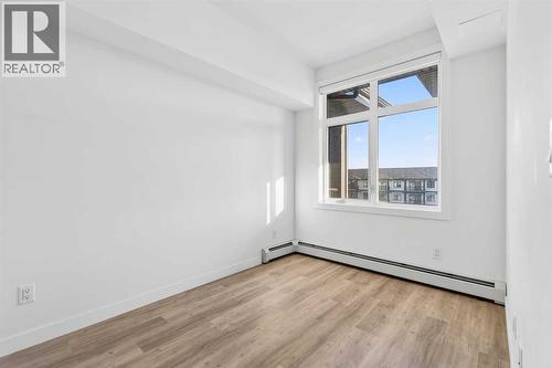 411, 40 Sage Hill Walk Nw, Calgary, AB - Indoor Photo Showing Other Room
