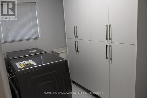 Laundry area and Direct Access to Garage - 5202 Buttermill Court, Mississauga, ON - Indoor Photo Showing Laundry Room
