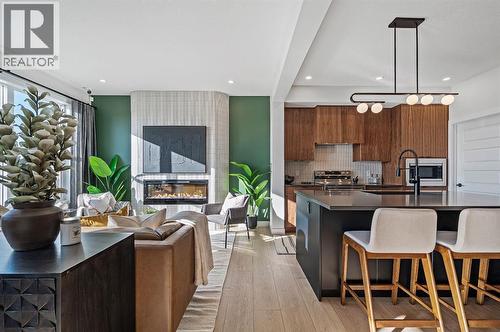 61 Keystone Creek Terrace, Calgary, AB - Indoor With Fireplace