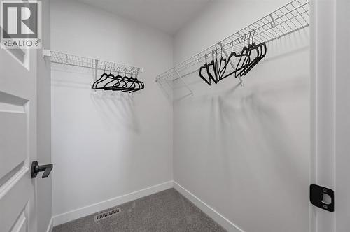 61 Keystone Creek Terrace, Calgary, AB - Indoor Photo Showing Other Room