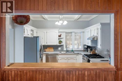 10507 Bradbury Drive Sw, Calgary, AB - Indoor Photo Showing Kitchen With Double Sink