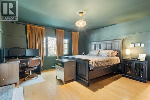 Primary Bedroom - 10507 Bradbury Drive Sw, Calgary, AB - Indoor Photo Showing Bedroom