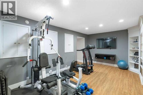 Gym Room - 10507 Bradbury Drive Sw, Calgary, AB - Indoor Photo Showing Gym Room