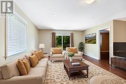 Living area, BR to right, patio back. - 