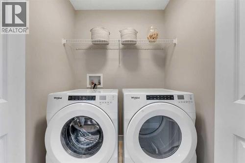 212 Edgefield Bay, Strathmore, AB - Indoor Photo Showing Laundry Room